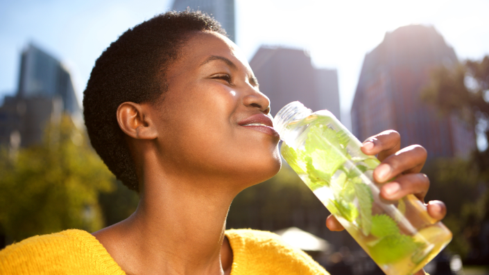 woman drinking juice