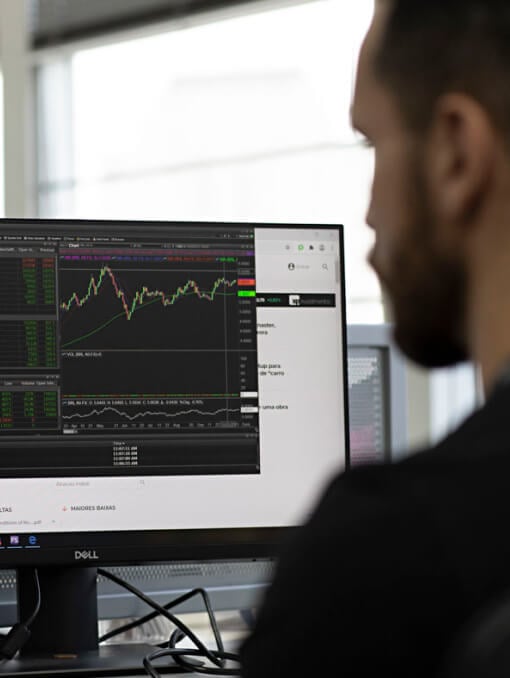 A person looking at a computer screen