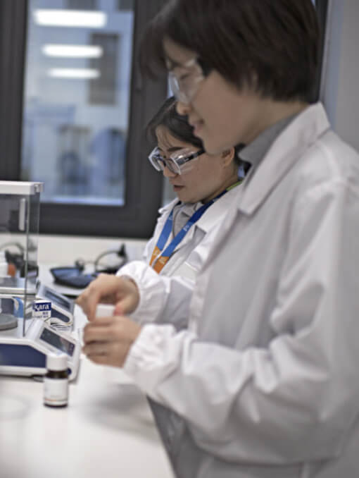 People working in a lab setting