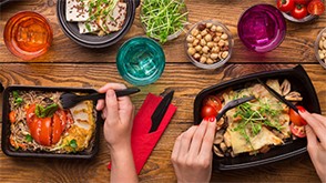 Ready Meals Report Dinner table with prepared takeout dishes