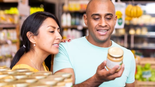 men and women in  the grocery store