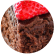chocolate cake slice with raspberry on top