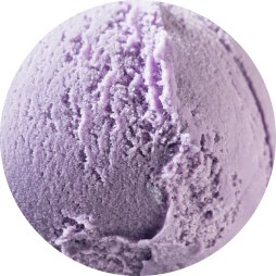 A close up of a scoop of reduced sugar purple ice cream.