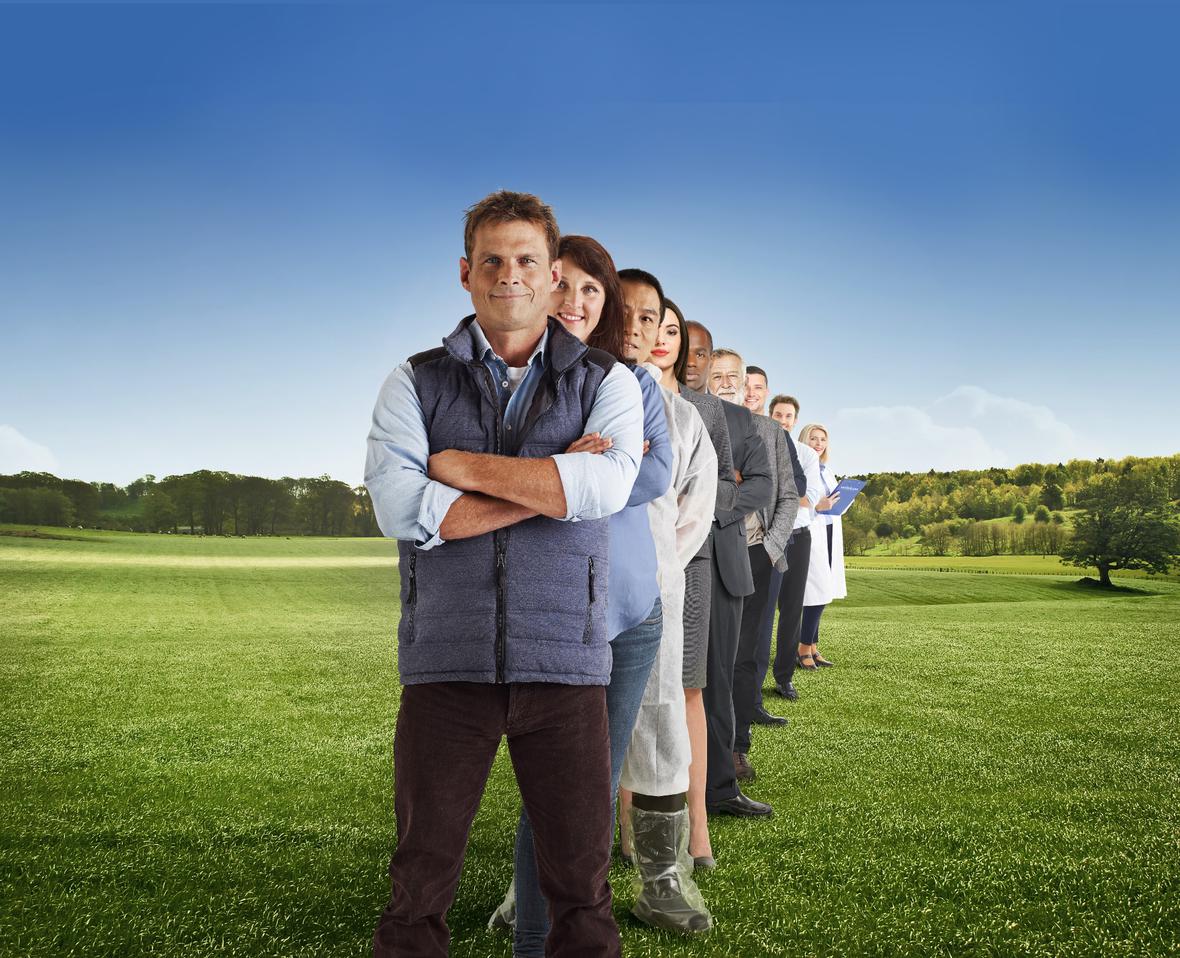 Wisium team members standing in a line in a field