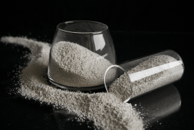 amino acids for animal nutrition in powder on a black background