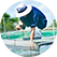 A man wearing a blue shirt with the ADM brand on the left arm is pulling a fish cage out of the water, amidst a background containing additional fish farms, including clear blue skies and green coloured water.