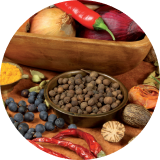 A close up of natural fruit and vegetable ingredients laid out on a table 