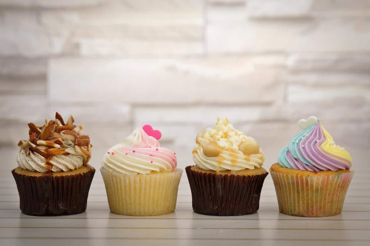 Four cupcakes of different varieties