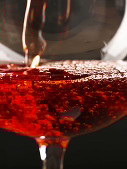 Close up of a succulent cup of red wine