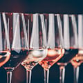 Close up of wine glasses on a dark background