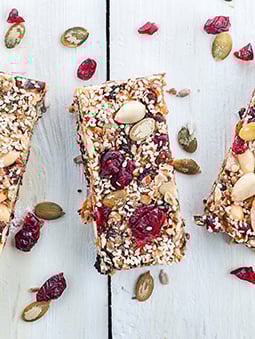 A group of granola bars with seeds and nuts