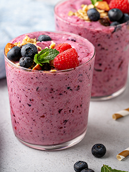 Two glasses of fruit smoothies