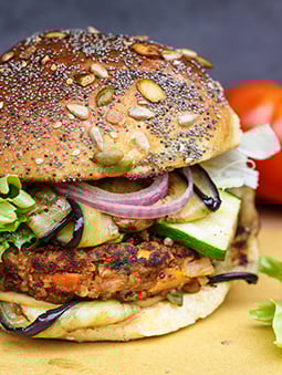 A close up of a burger