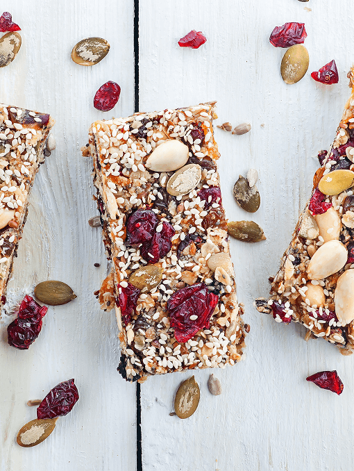 A group of granola bars with seeds and nuts