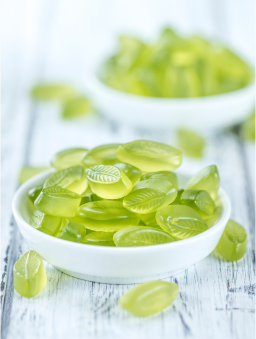 Lime gummy supplements colored with naturally derived green color solutions