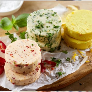A close-up of herbed butters