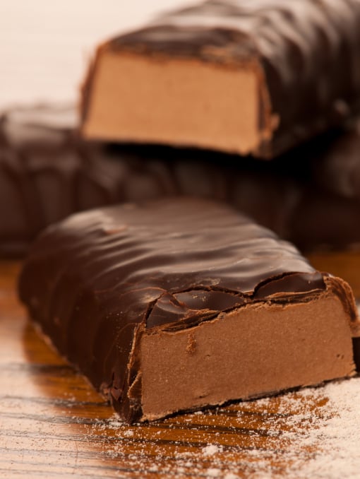 A close-up of chocolate-dipped protein bars