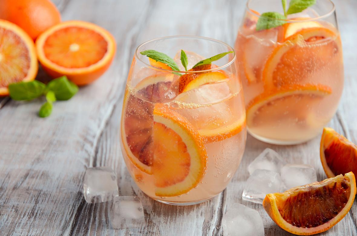 Cold, refreshing drink with blood orange slices