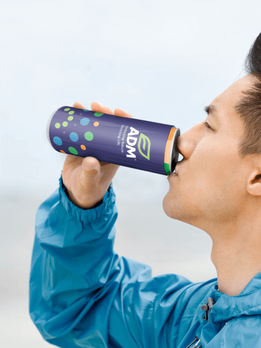 person drinking adm energy drink