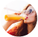 women drinking orange juice