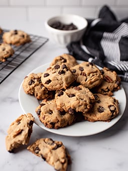 Chocolate chip cookies on a white plate