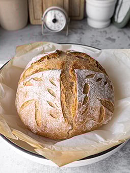 A round loaf of crusty bread