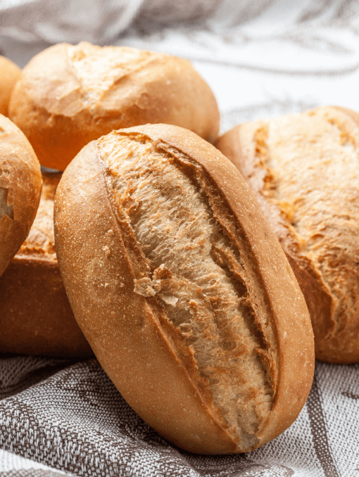 Loaves of crusty white bread
