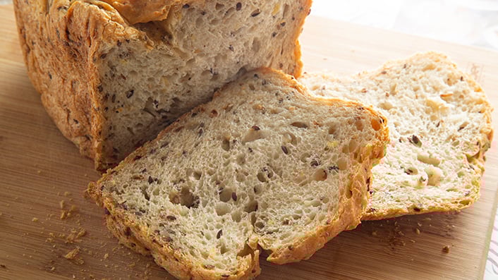 IMAGE ALT TEXT Slices of white bread with seeds