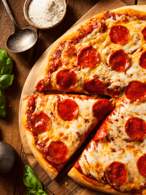 Pepperoni pizza with a slice cut