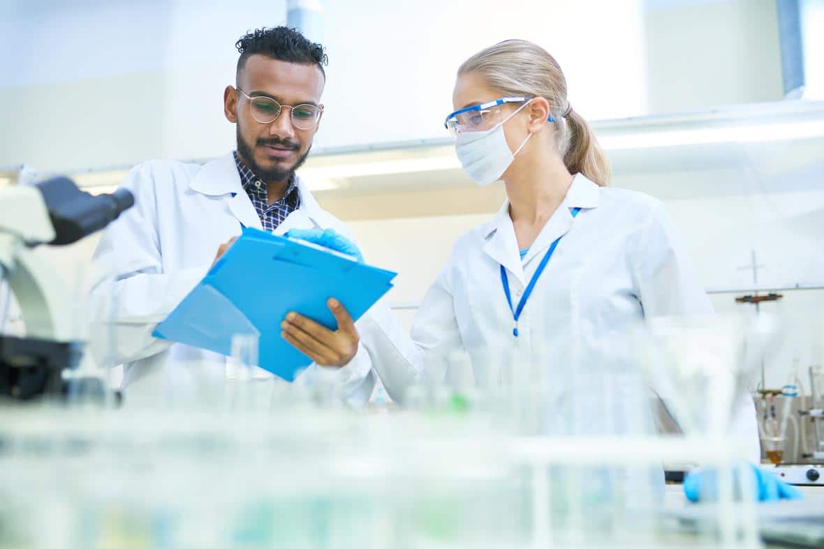 International team of scientists working in a lab