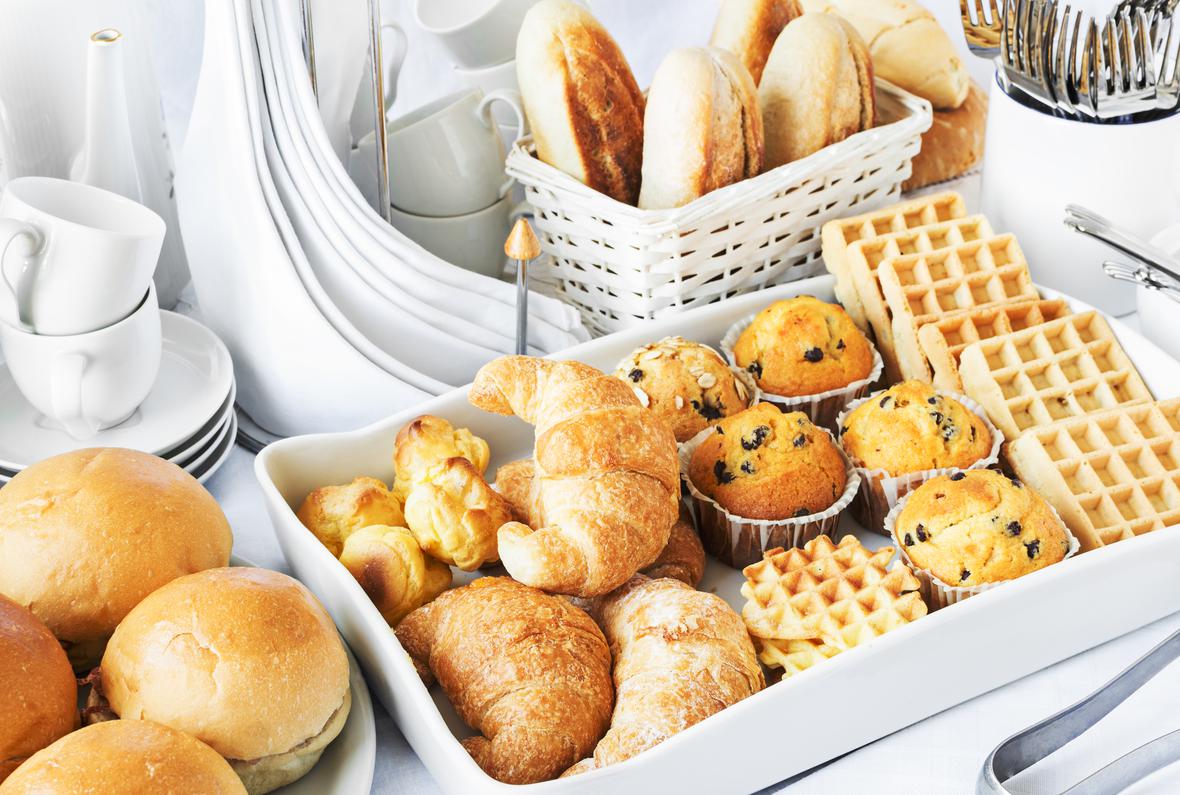 Baskets with a variety of baked breakfast foods