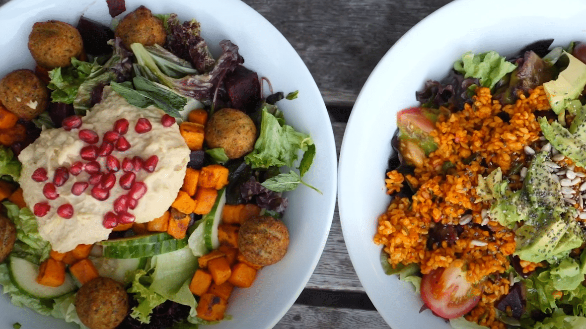 table with food in plates