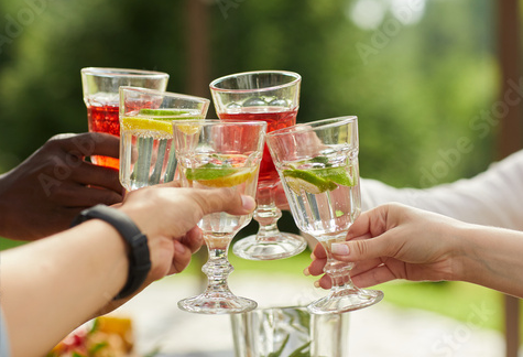 Multi-ethnic friends enjoying a variety of beverages