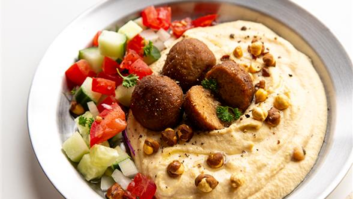 A plate of food with pita bread