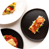 Overhead view of plates of food on a table