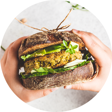 A close up of a veggie burger
