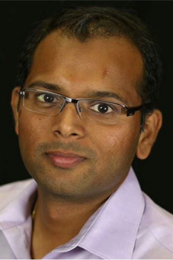 Photograph of a man with glasses