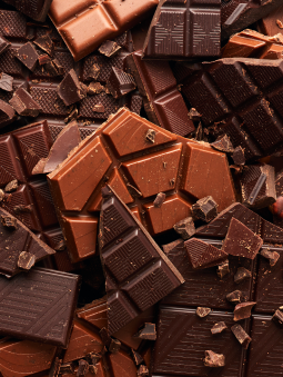 Broken pieces of dark and milk chocolate bars