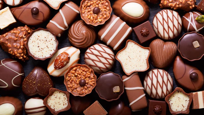Multiple kinds of truffle-type chocolates enhanced by emulsifiers for improved consistency and mouthfeel