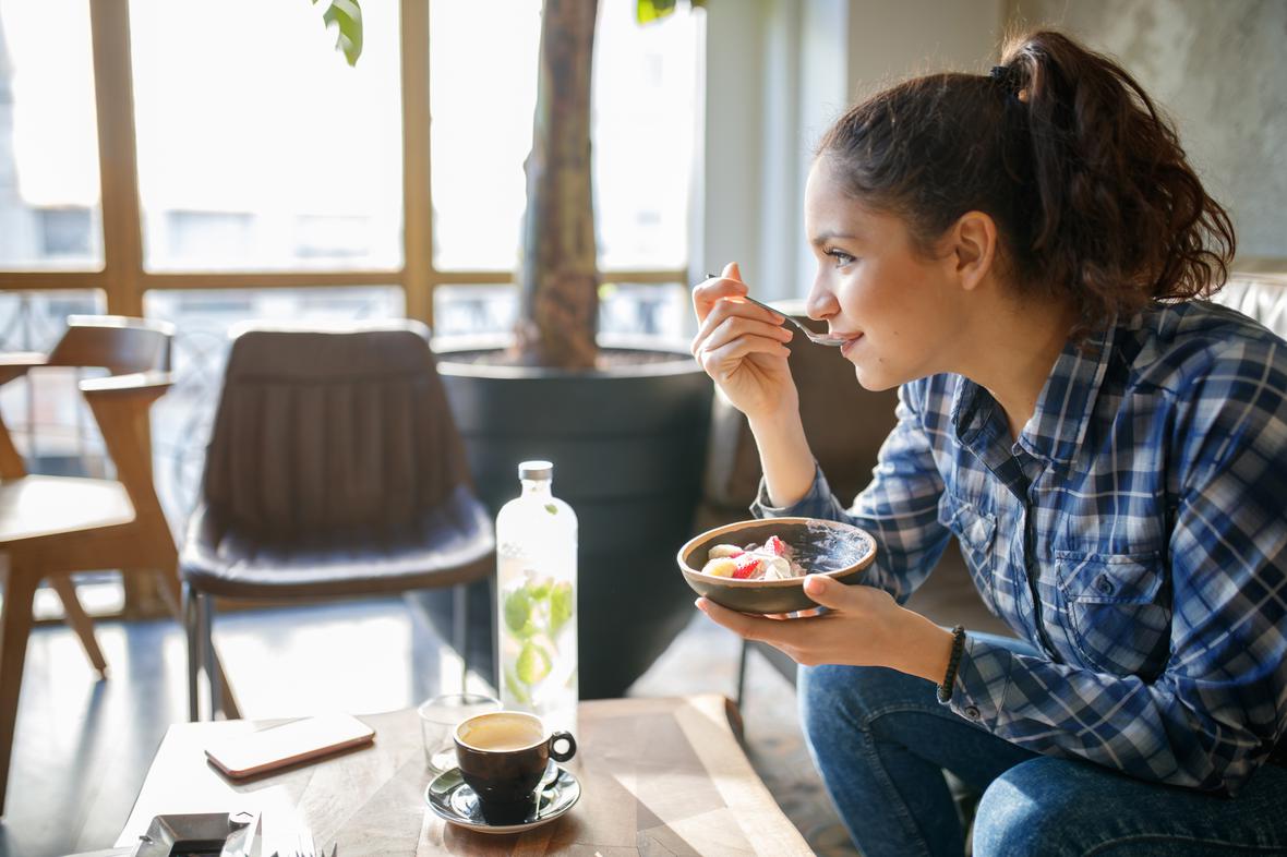 Woman enjoying thick, creamy yogurt
