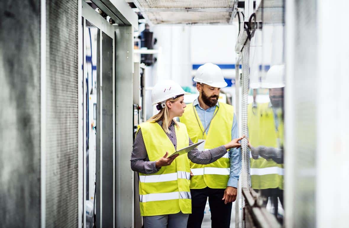 workers man woman with tablet in factory-AdobeStock_227988585-min.jpeg