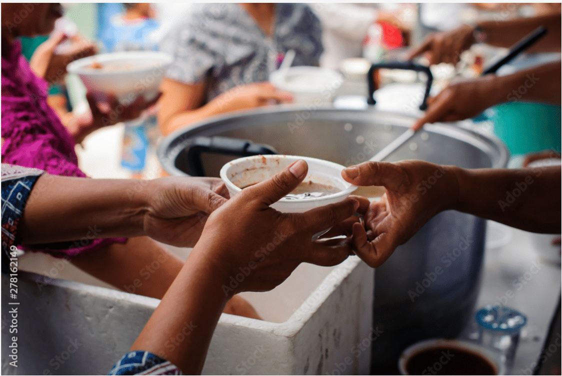 Hands serving food