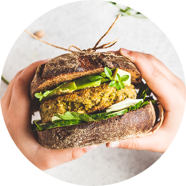 A close up of a veggie burger