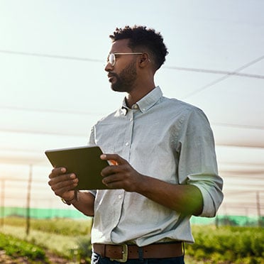 A person holding a tablet