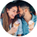 A man and woman share a close laugh while enjoying reduced sugar ice cream cones.