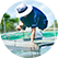 A man wearing a blue shirt with the ADM brand on the left arm is pulling a fish cage out of the water, amidst a background containing additional fish farms, including clear blue skies and green coloured water.