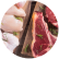 Raw steack and raw chicken on a wood board