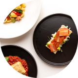 Overhead view of plates of food on a table
