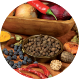 A close up of natural fruit and vegetable ingredients laid out on a table 