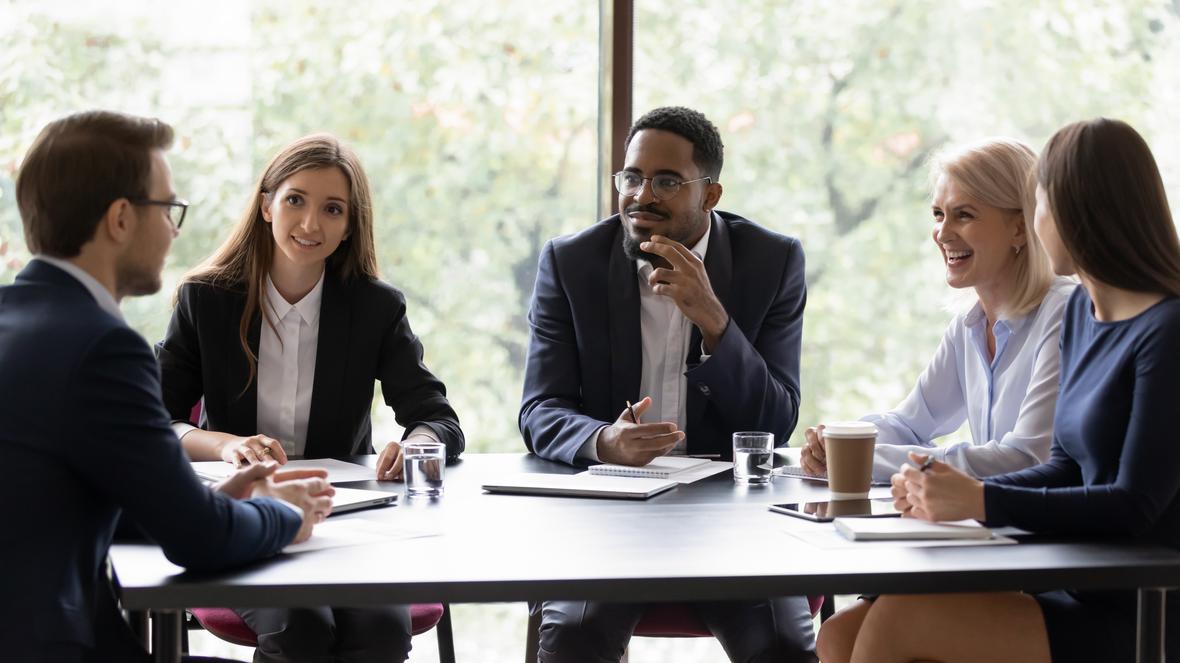 Diverse workmates participating in a meeting